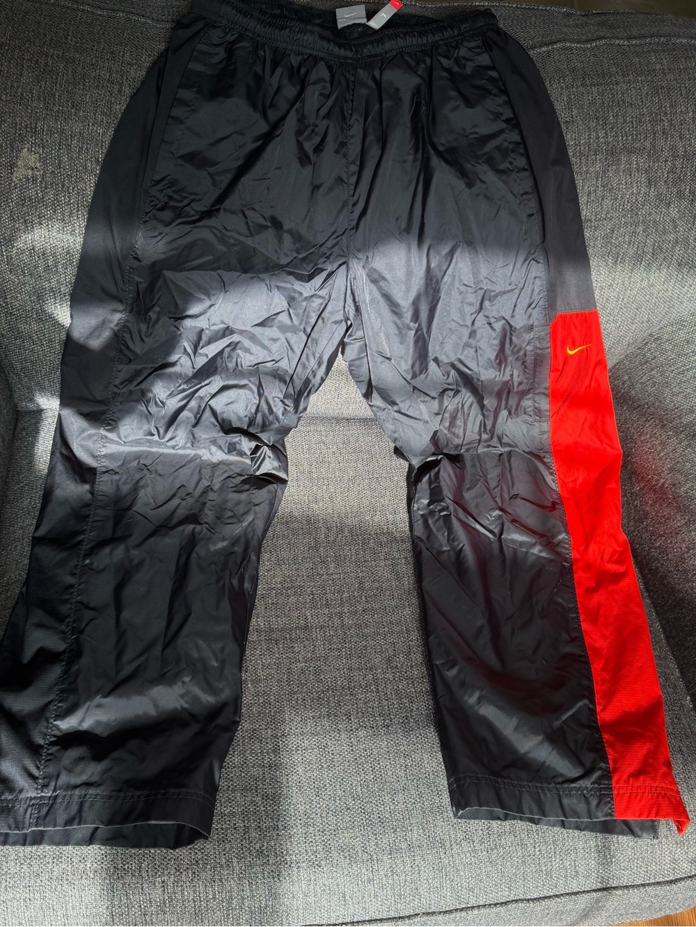 Y2K Nike Black Track Pants with Red Inner Panel